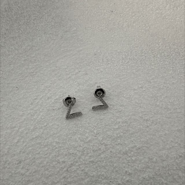 BOUCLES D’OREILLES HISTÓRIA