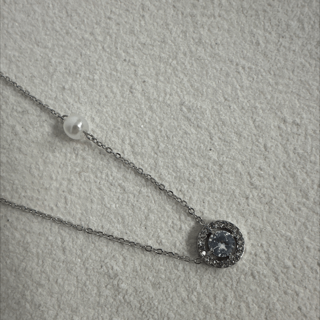 COLLIER SOHNOS 