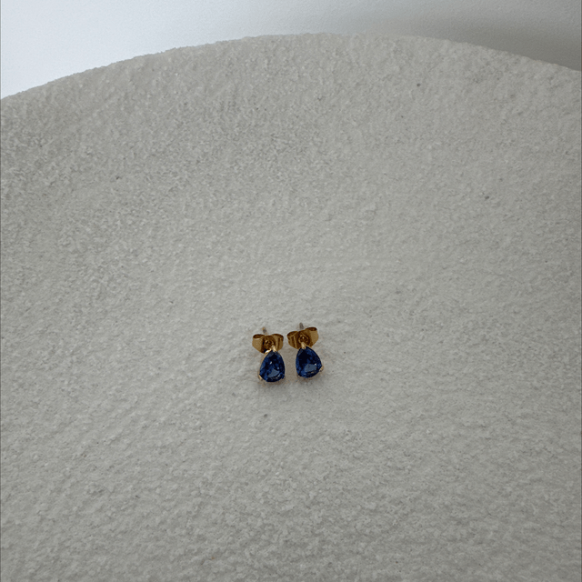 BOUCLES D’OREILLES HISTÓRIA