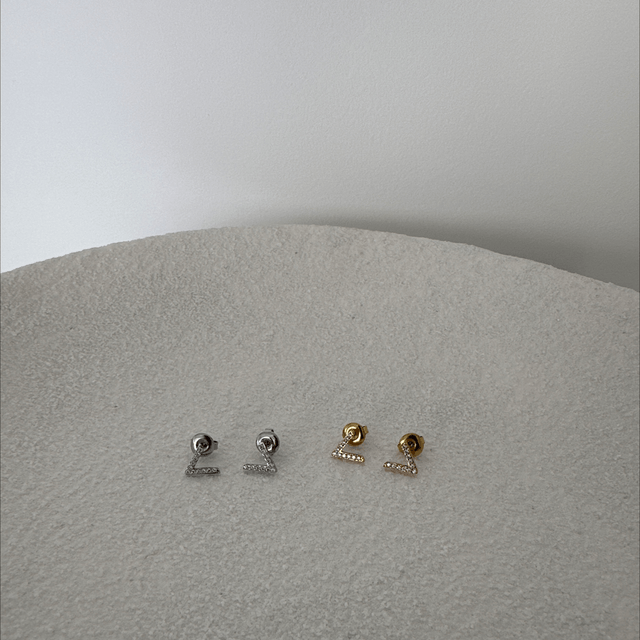 BOUCLES D’OREILLES HISTÓRIA