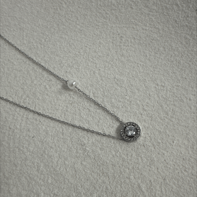 COLLIER SOHNOS 