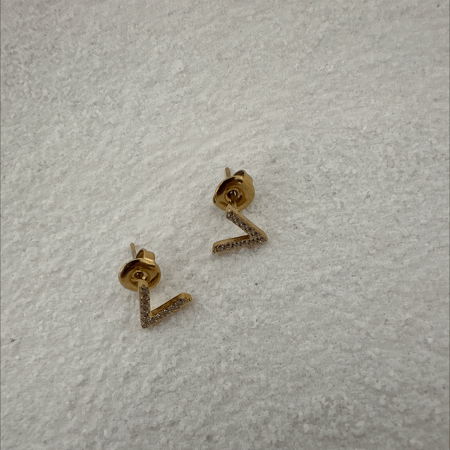 BOUCLES D’OREILLES HISTÓRIA